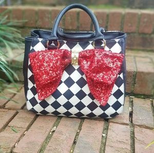 Betsey Johnson black and white check handbag.